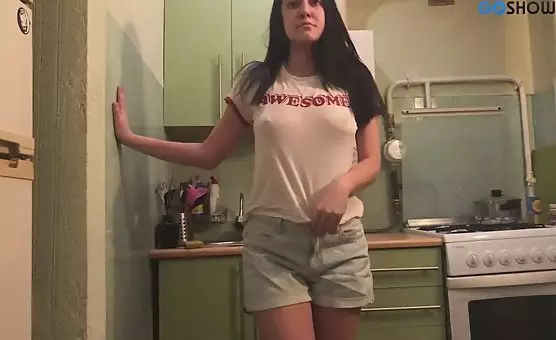 Brunette Performs Sensual Striptease at Home